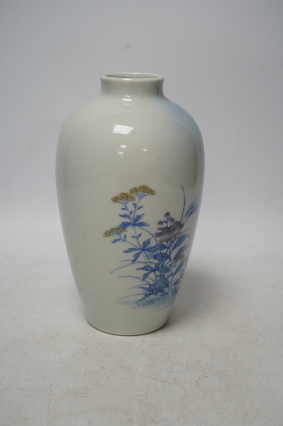 A 20th century Japanese porcelain vase, 19cm high. Condition - fair to good